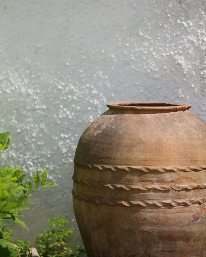 Close up detail of rope banding detail of large terracotta pot