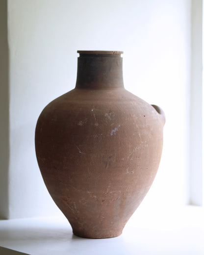 Back view of naturally aged clay pot from Turkey