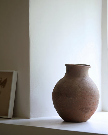 Vintage old pot shown as shelf display piece