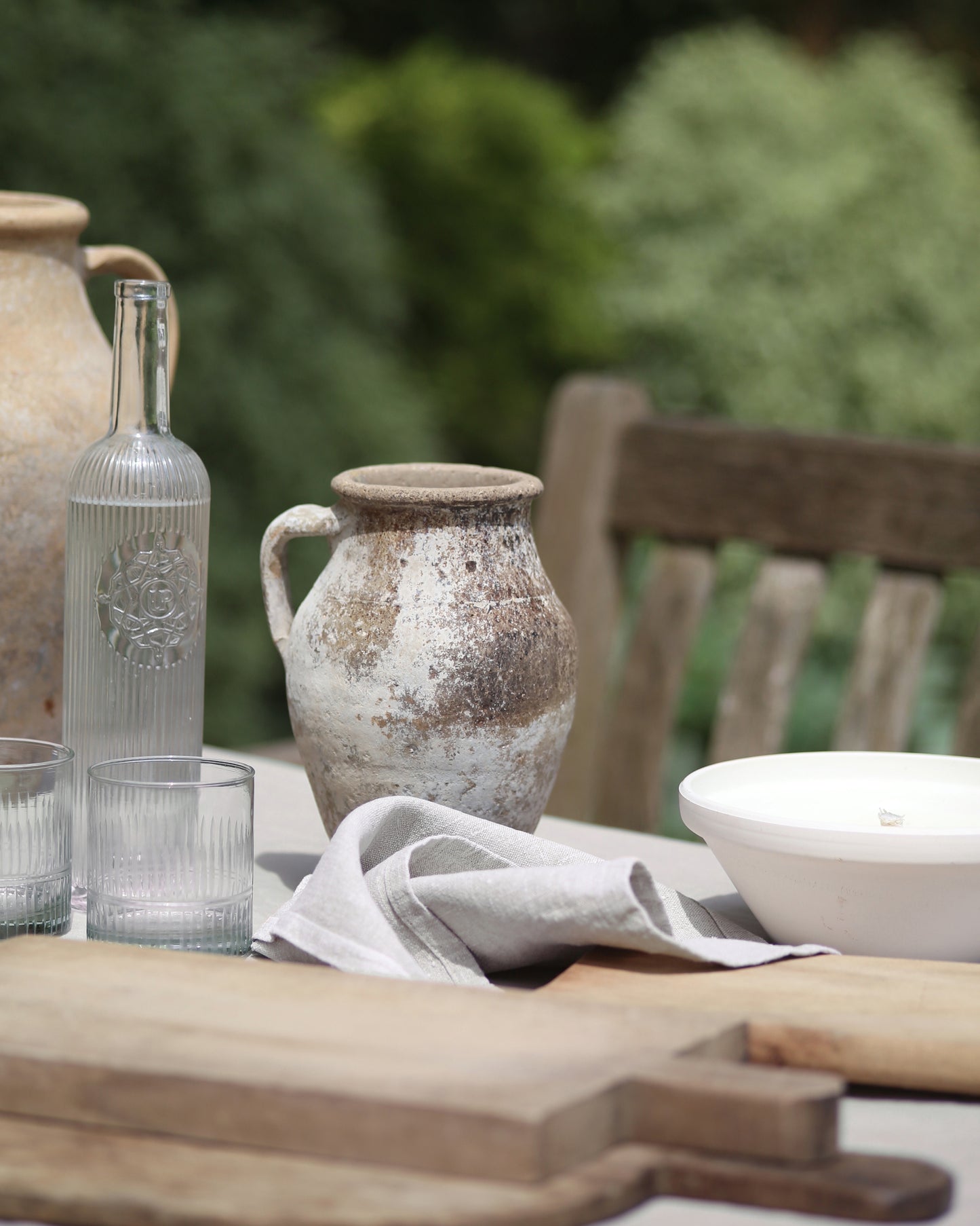 Small olive pot used as decoration of mediterranean inspired tablescape