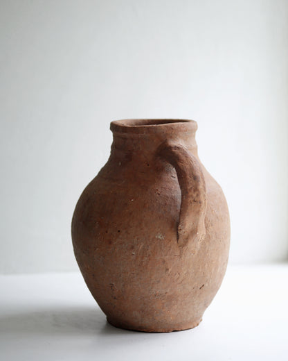 Artisan details of old antique pottery jug from Turkey