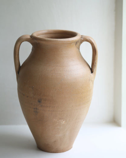 Vintage pot made from terracotta to use as vase and decorative