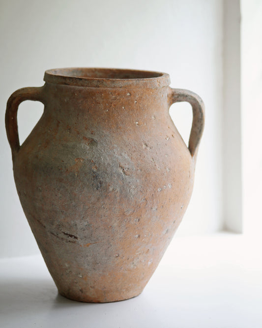 Pale terracotta pot with aged patina
