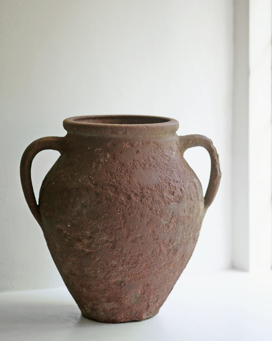 Rich red rustic terracotta urn