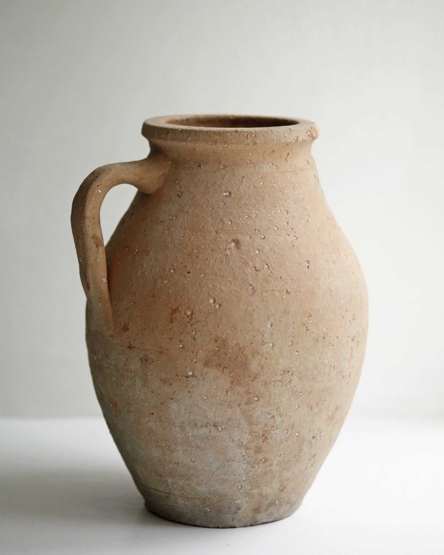 Classic Mediterranean terracotta pitcher pot as decorative piece