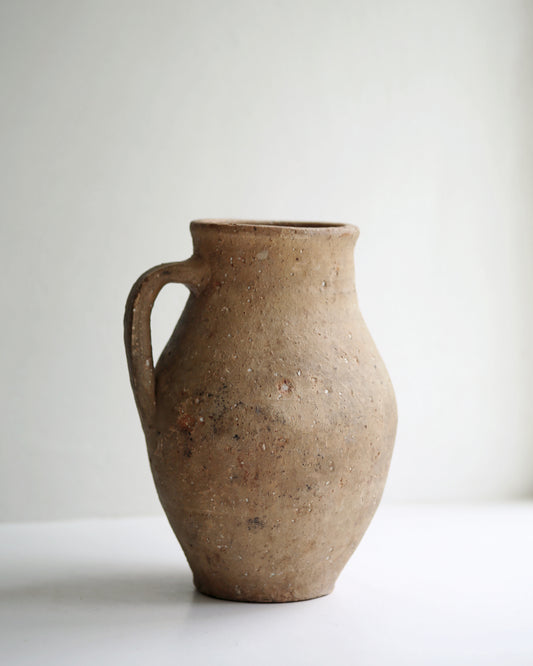 Small rustic terracotta pottery jug from Turkey