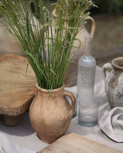 Rustic Turkish olive pots for a mediterranean inspired garden table