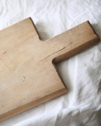 One of a kind raw pale wooden chopping board