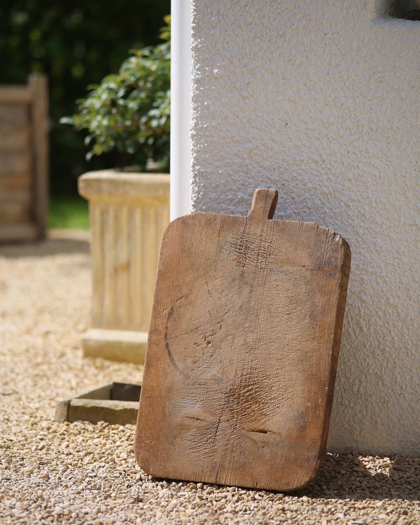 Vintage wooden bread board with signs of age