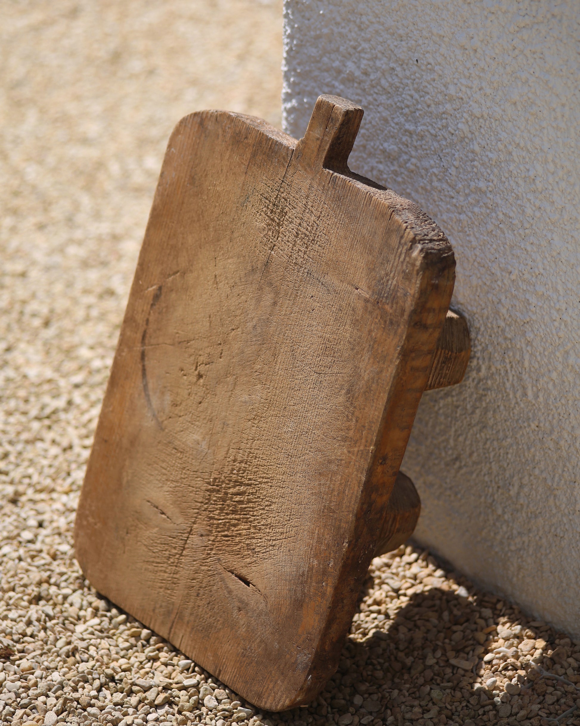 Authentically aged wooden board on chunky legs