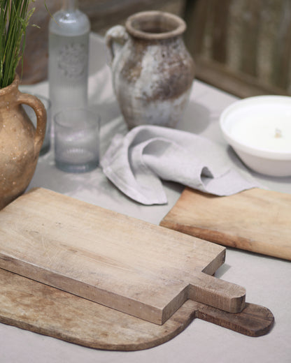 Vintage breadboards used for garden hosting