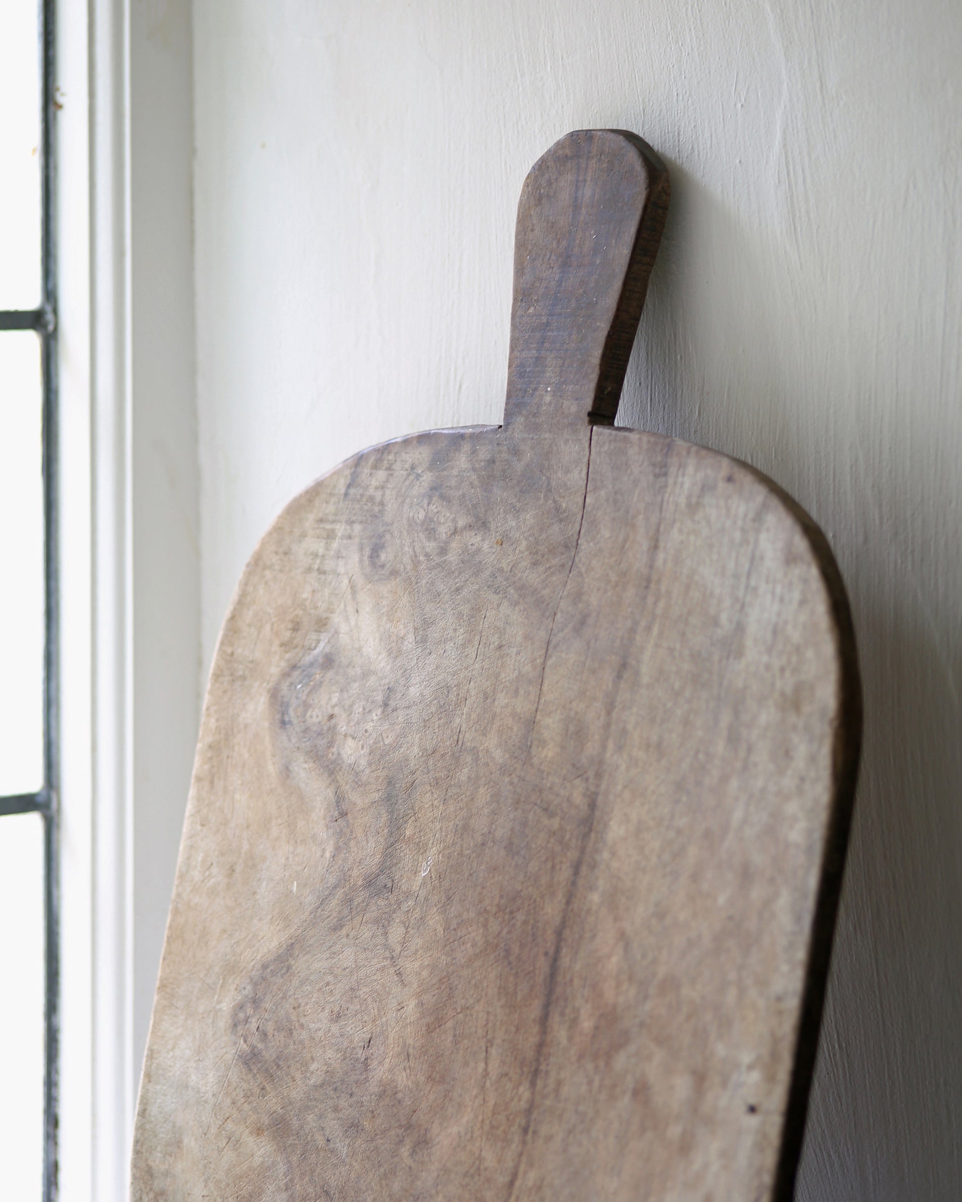 Close up of wood grain of unique wooden chopping board