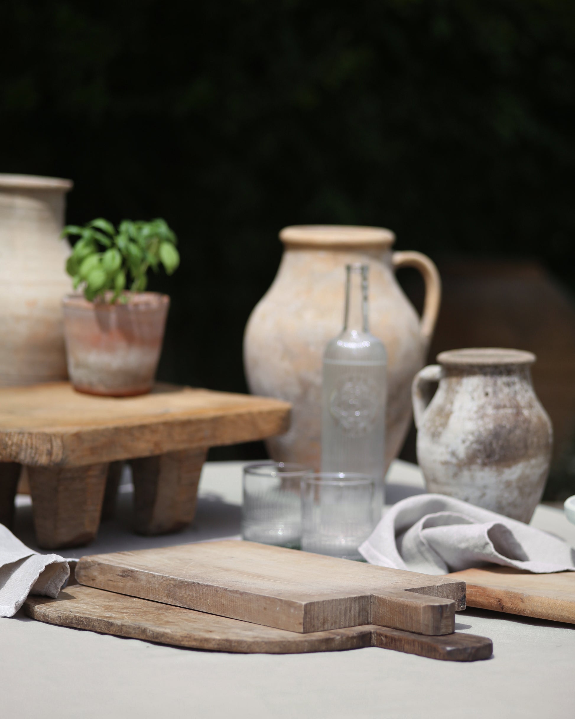 Rustic wooden boards used as serving ware for summer dining