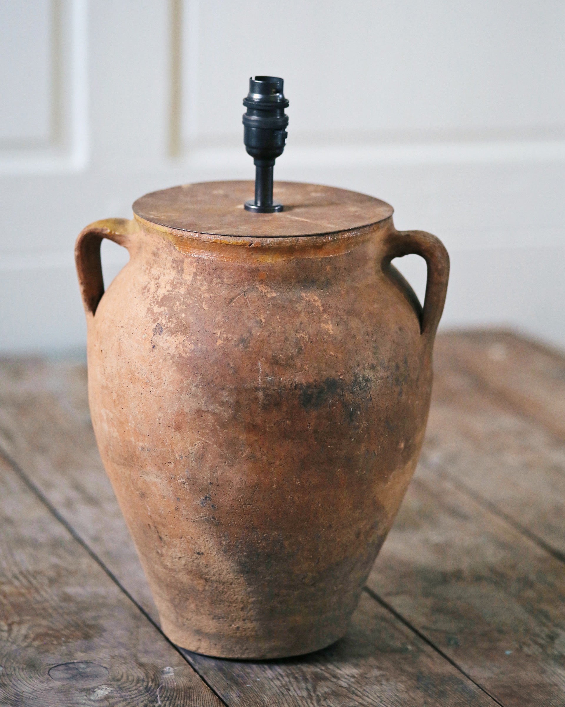 Antique table lamp with rustic brass fittings