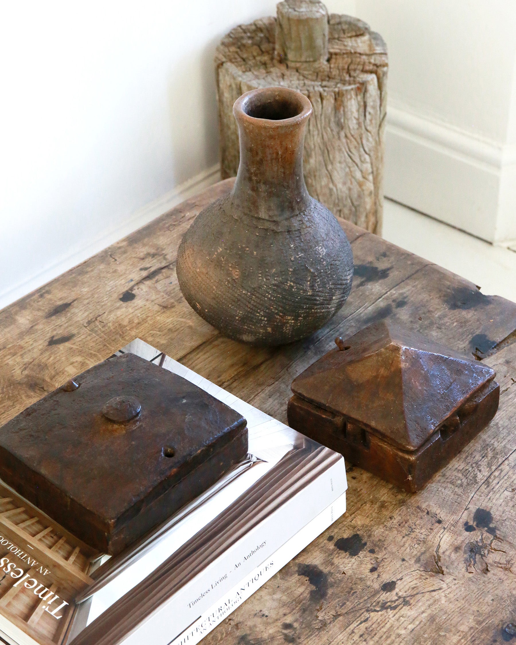 Coffee table styling of antique wooden accessories