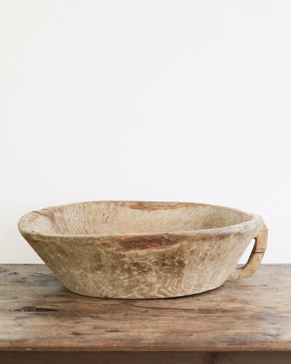 Large rustic wooden dough trough bowl with carved handle