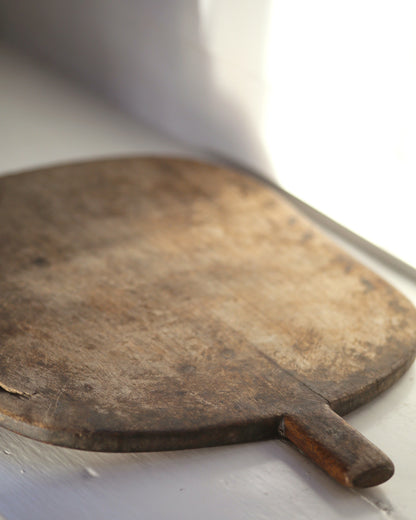 Aged wood chopping board